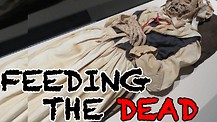 Christians practicing Necromancy Rituals? Feeding Tubes Connected to Graves